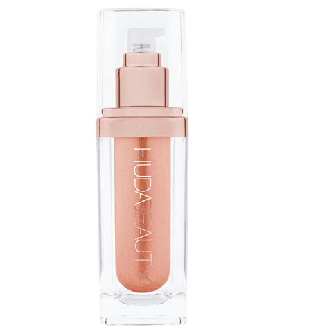 Truco de belleza para piel luminosa con maquillaje de Huda Kattan. Producto iluminador dorado Huda Beauty Aphrodite.